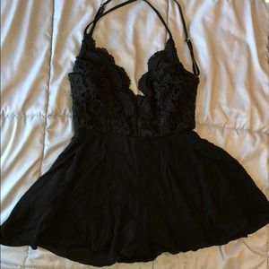 Really cute backless black short romper